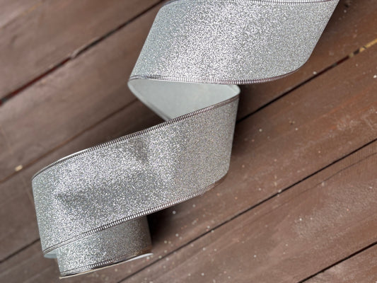 63mm GLITTERED SILVER FABRIC WIRED EDGE RIBBON x 10yrds
